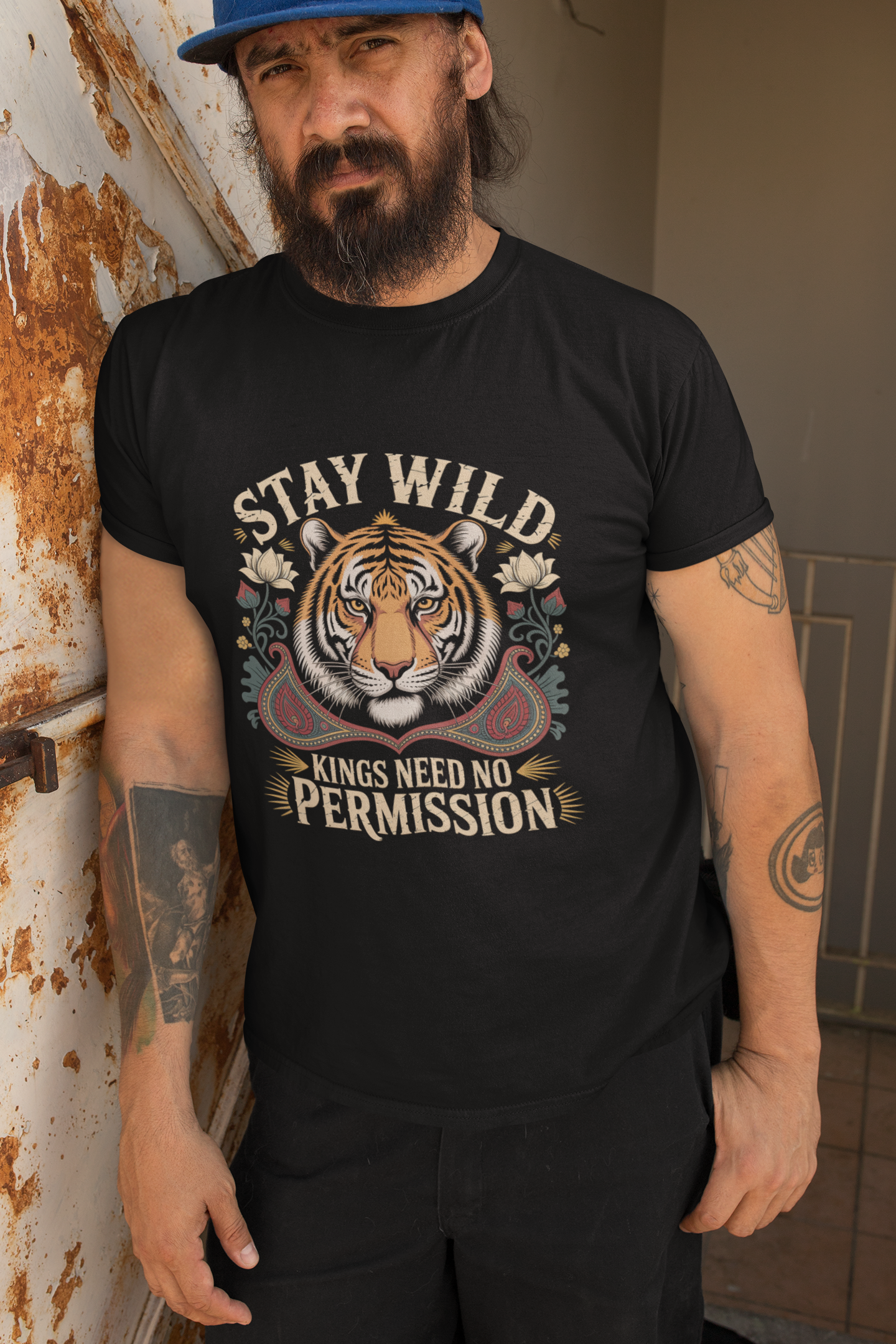 Stay Wild — vintage tiger tee worn by bearded man against rusty wall